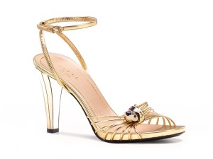 Gucci women's sandals in gold Leather